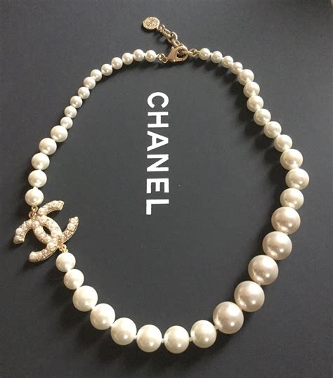 chanel 100 anniversary pearl necklace.